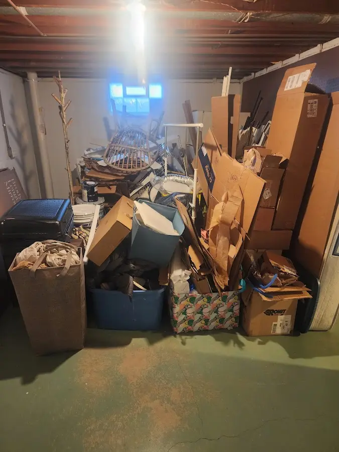 Roll-off dumpster container at job site for 8 Yard Dumpster Rental in Edina